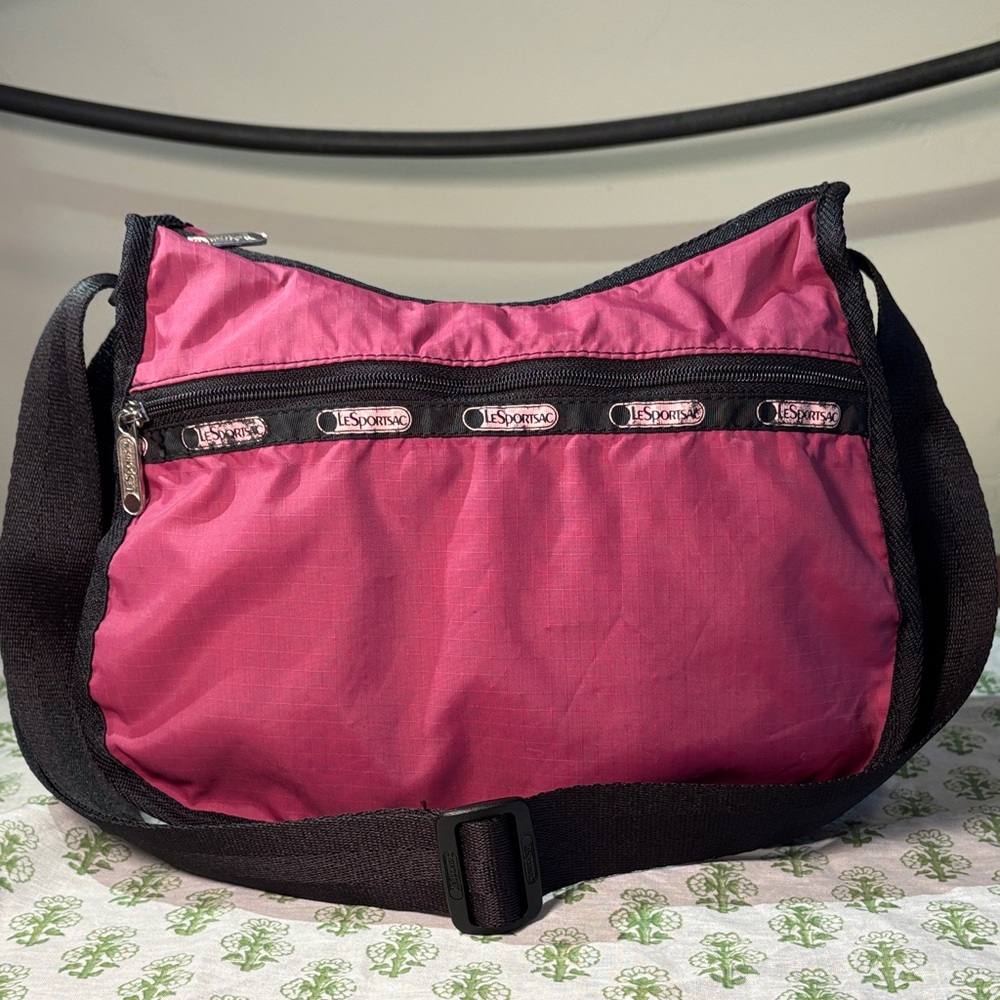 LeSportsac crossbody purse magenta and black